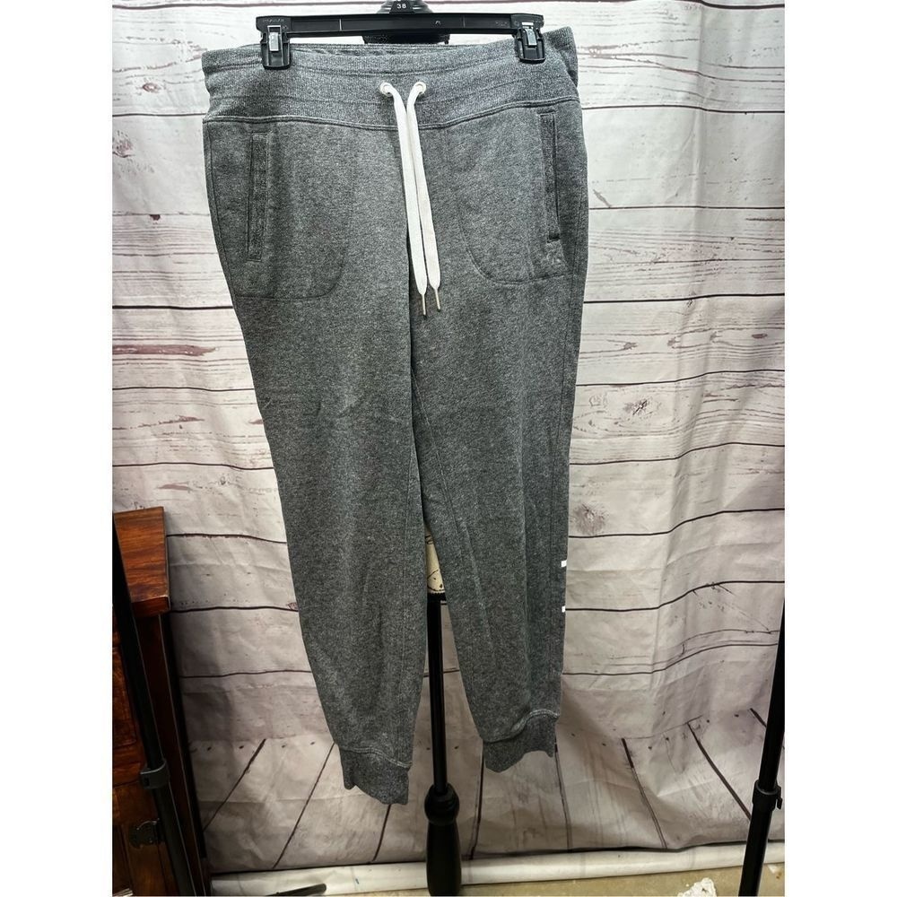 Calvin Klein small gray‎ sweatpants with tie. Tapers at ankle. Super soft inside